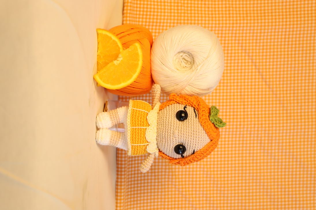 Boneca Laranja