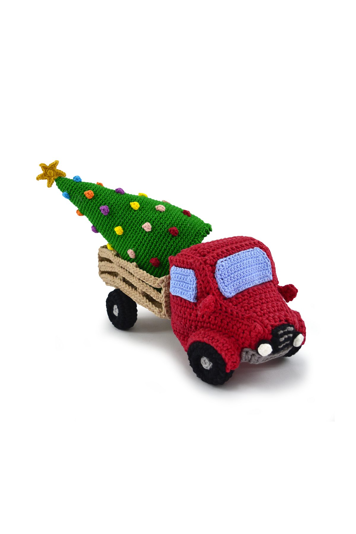 Um caminhão de brinquedo rosa com um pneu preto.